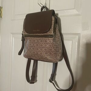Calvin Klein Tan and Brown Logos  small Backpack logo tone hardwares.